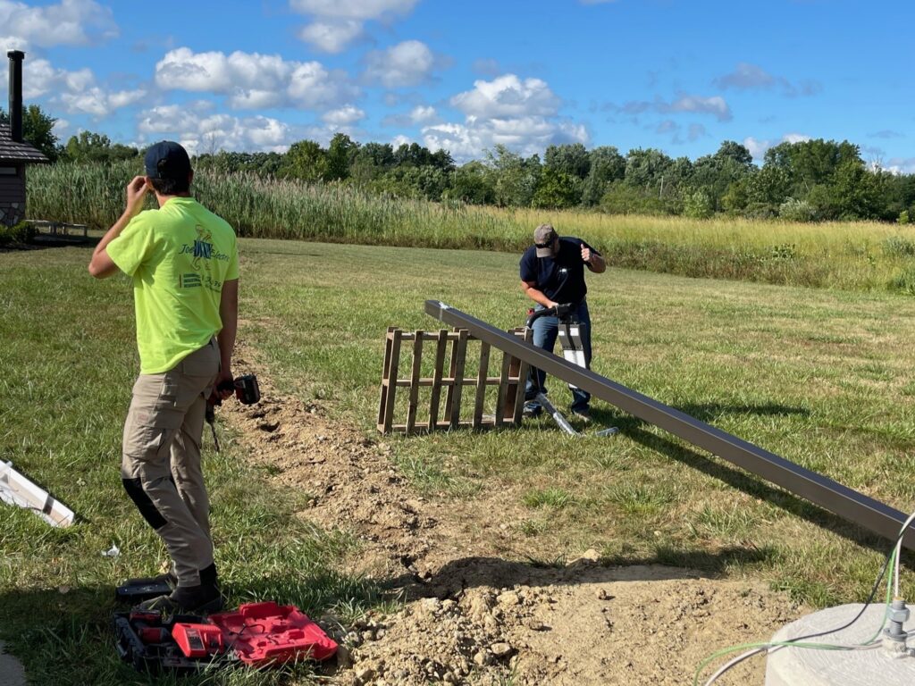 Dickey Electric preparing to mount light pole at The Walnut Grove