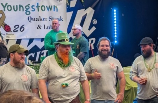 Peter Barone, IBEW Local 64 member and St. Baldrick's participant, next to his friend Burt "Skeeter" Baird, who was the 