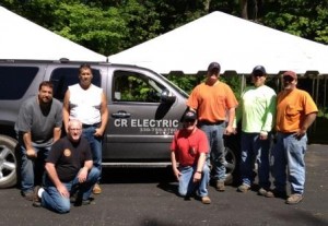 CR Electric of Liberty set up the electricity needs for the Liberty Relay for Life this month as a community service project. Involved in the project were (left to right) Jason Rubin, Bill Booth, Tim Barringer, Jack Kelly, Roger Peskor, Dwight Prowitt and Tim Moran.