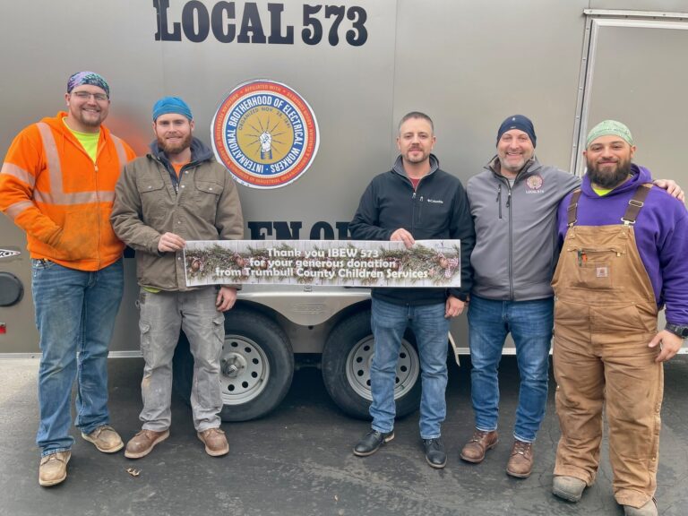 IBEW Local 573 leadership, Todd Ambrose and Mark Phillips, and three apprentices, Luke Culp, Wyatt Baer and Sean Duckworth, for bike donation at Trumbull County Children Services