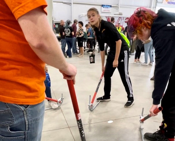 Students at MVST Expo bending conduit.