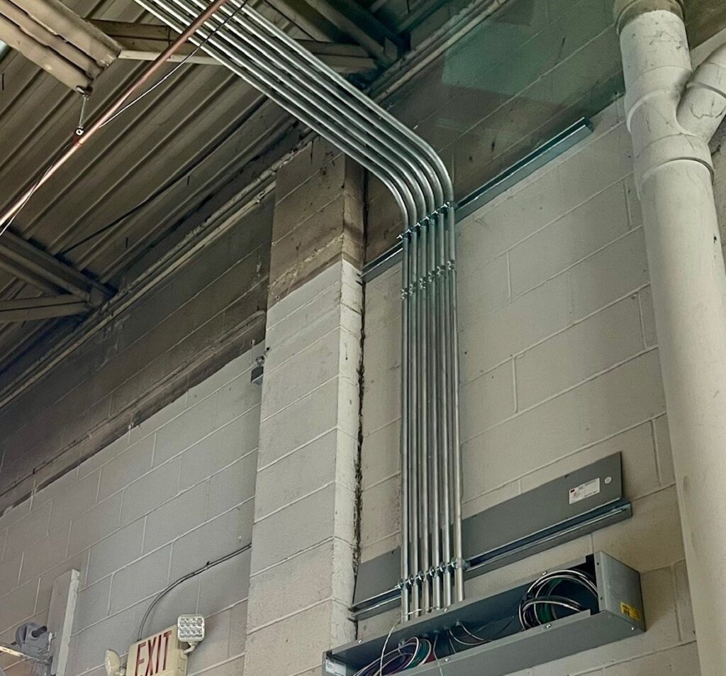 Conduit running to the ceiling.