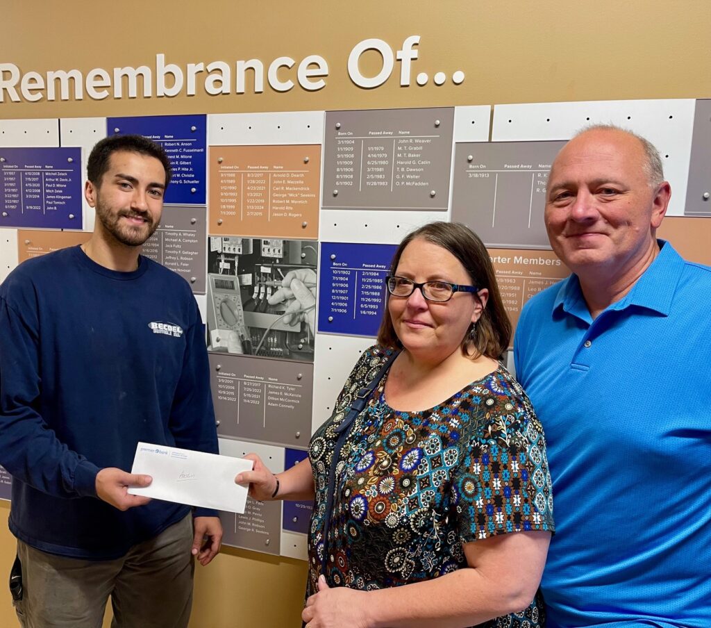 Amy and Matt Connelly, with Austin Claussell, recipient of a memorial scholarship in honor of their late son, Adam, who passed away following a car accident in November 2022.