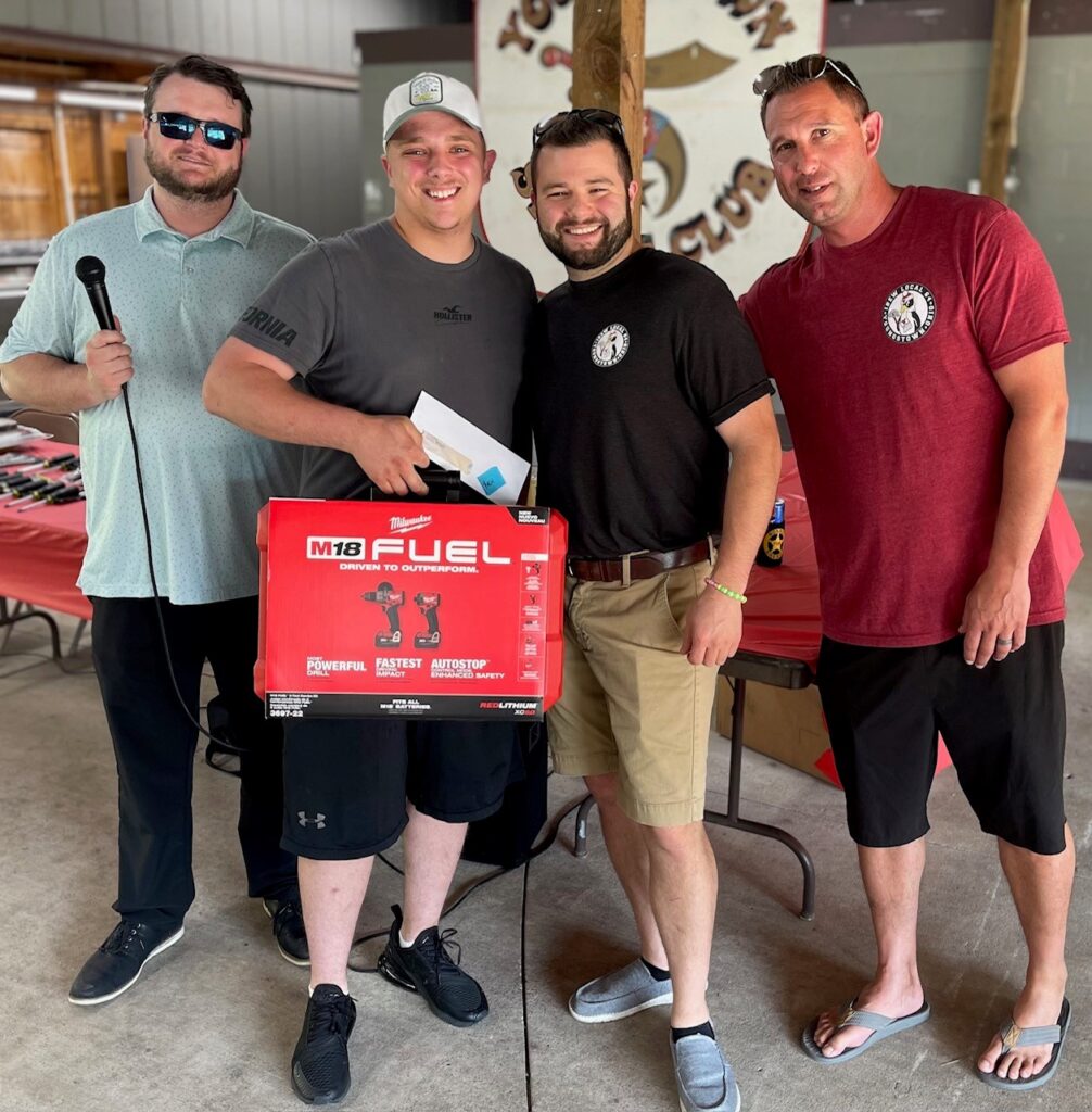 Connor Reid, apprentice of the year for residential program, with award at Local 64 picnic. Also pictured, Cody Hilliard, Ahren Peplow and Kenny Lucas.