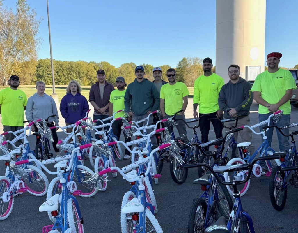 IBEW Local 573 members outside with the completed bikes.