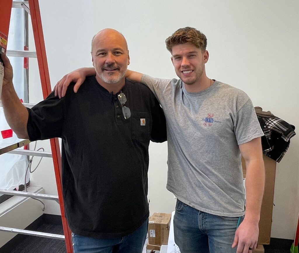 Dave McGoogan, with Tom Plummer, second-year apprentice with Dickey Electric.