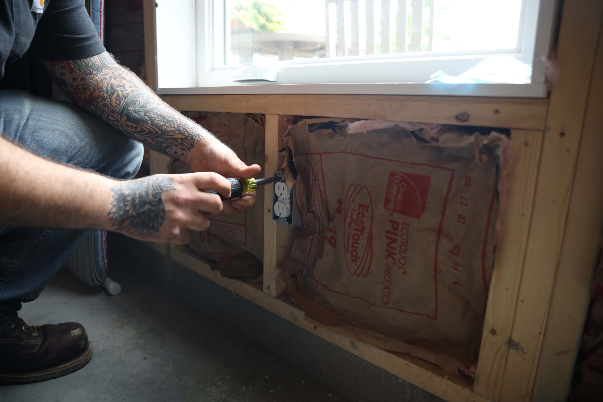 electrician wiring a house