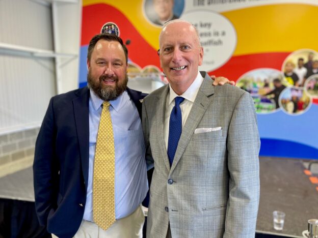 Eric Carlson, president of "Joe" Dickey Electric with Bob Hannon, president of United Way of Youngstown and the Mahoning Valley