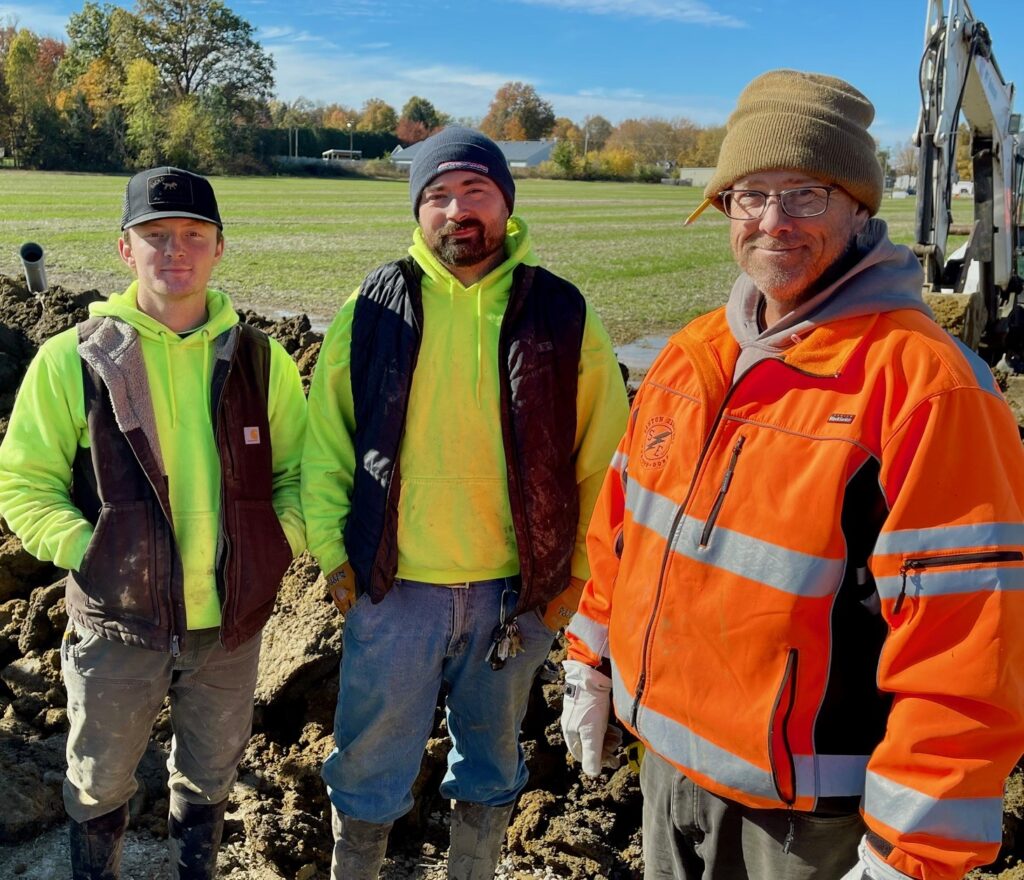 Joey Hawkins, Clinton Rapp and Ryan Lane, of Santon Electric, on the Shepherd of the Valley construction site in Salem.