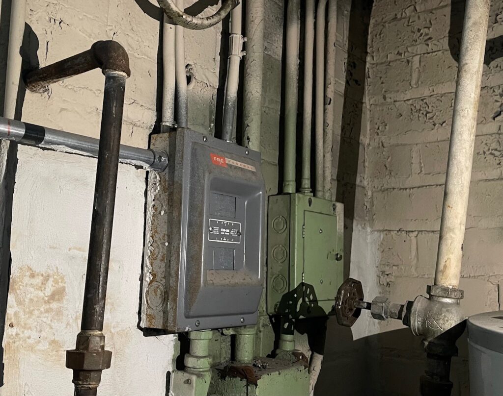 Old electrical panel in basement.