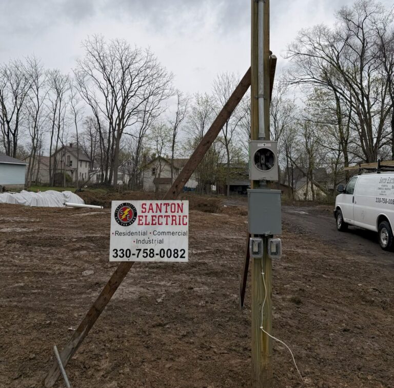 Santon Electric sign near the Dylan's House site in Struthers.