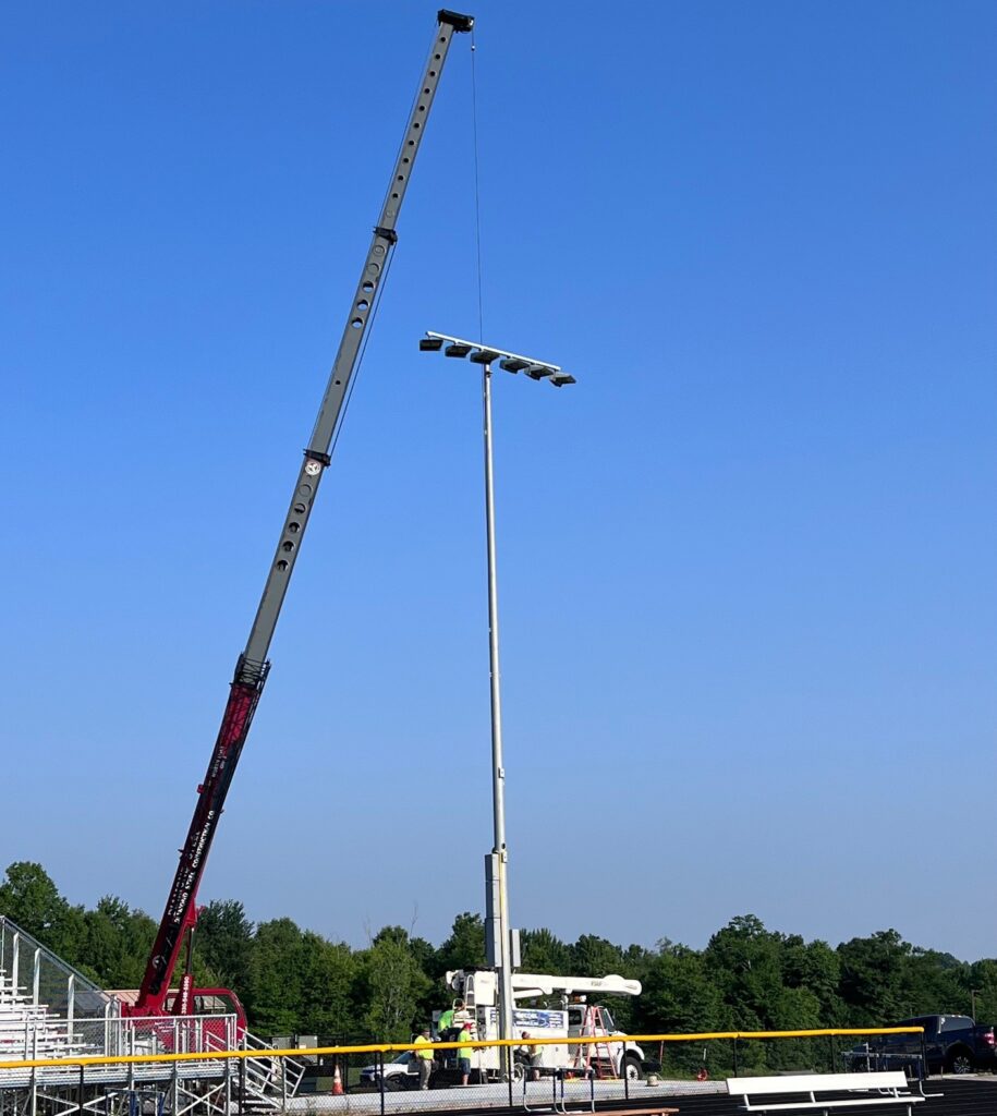 Becdel Controls installs light pole for Brookfield stadium.