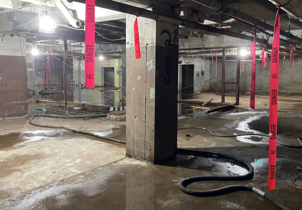 Sub-basement issues to be fixed before plans finalized.