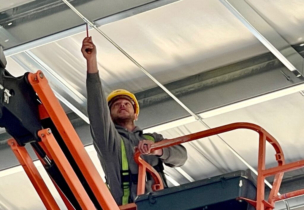 As an electrician, installing the conduit along the ceiling isn't out of the ordinary for a day on the job.