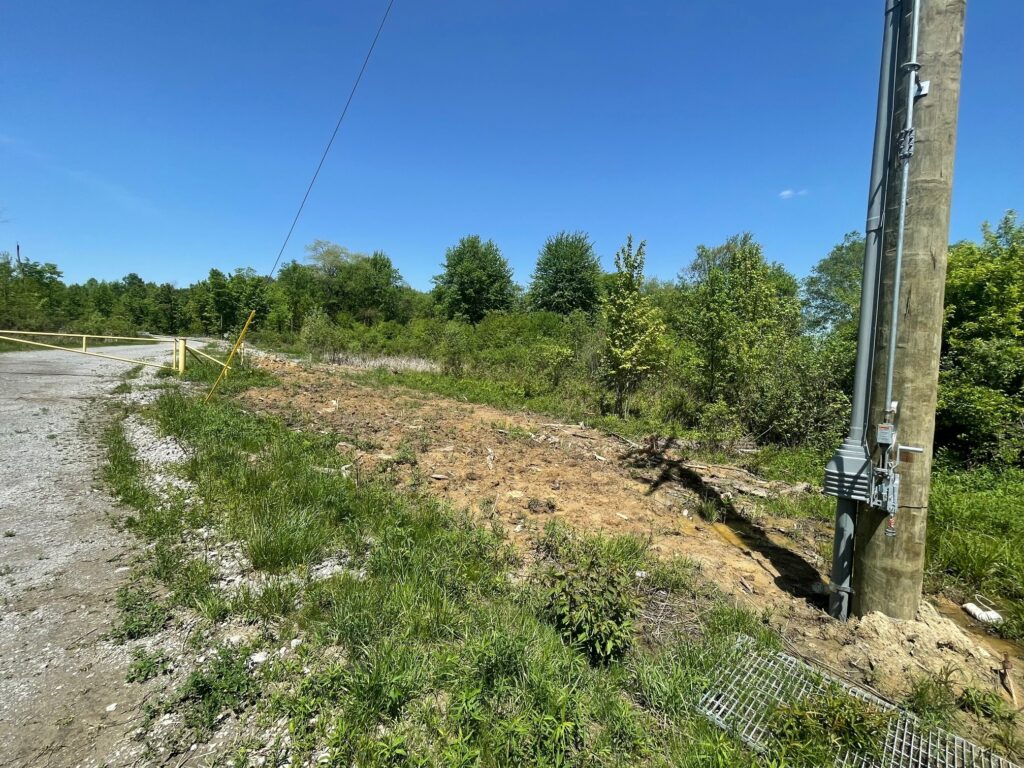 High-voltage wires run nearly 4,000 feet from the pole to the injection well site.