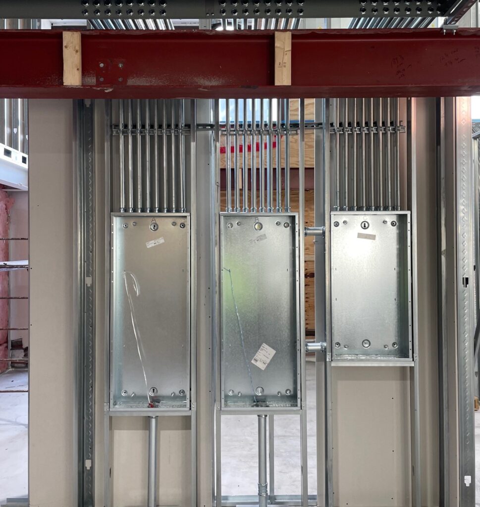 Before picture of main electrical panels inside Chase Bank.