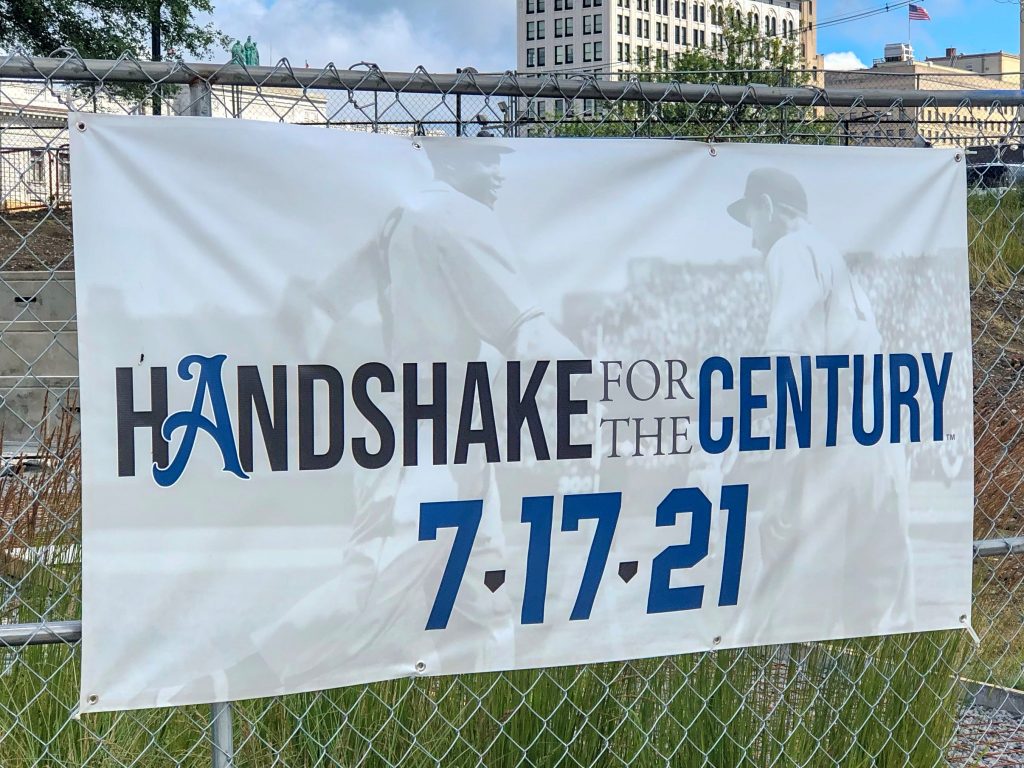 Handshake for the Century signage